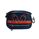 Navy blue women's sling bag with bunny-ear detailing, rust-brown accents, golden-tone studs, and front zipper pocket.